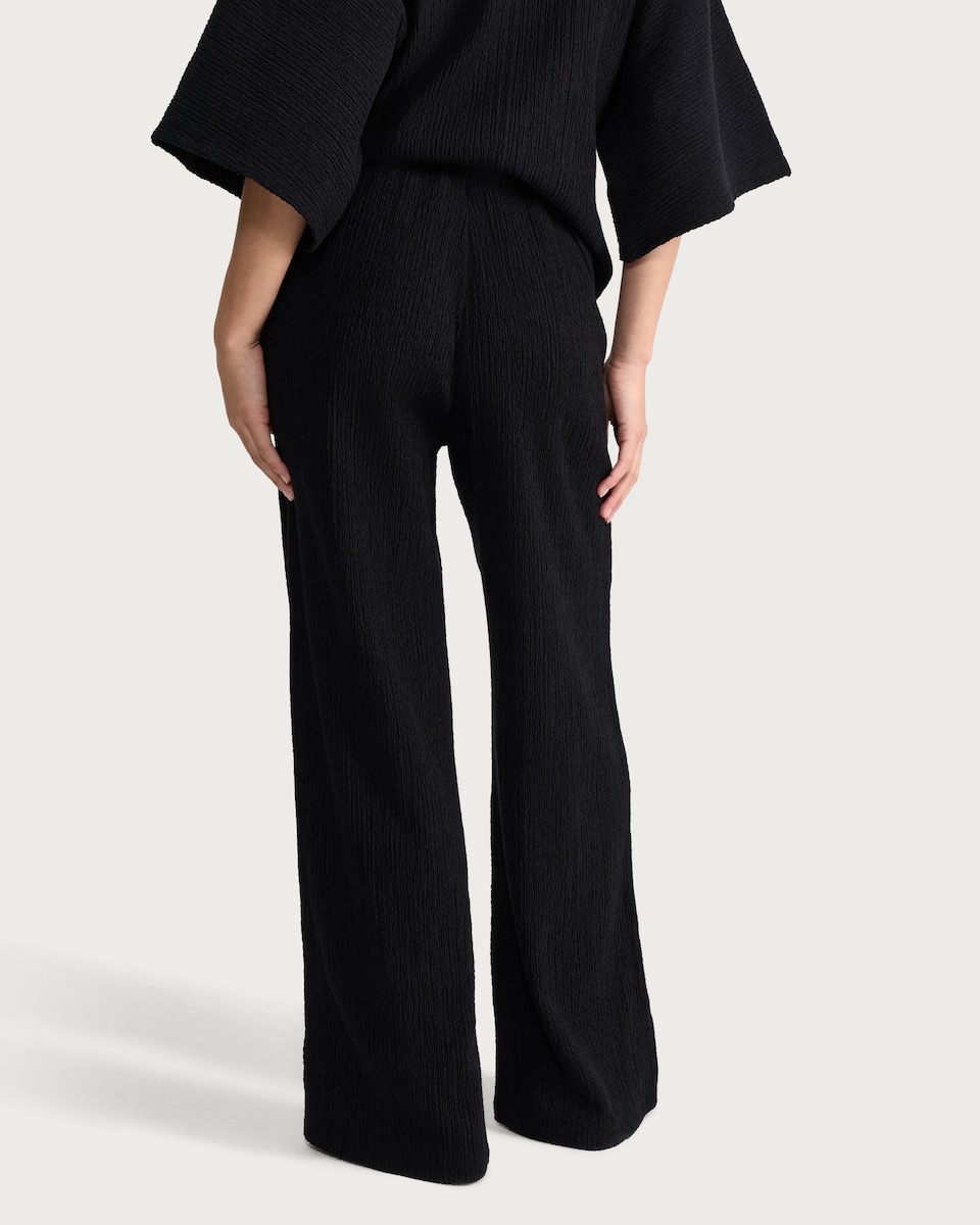 image 1 of F&F Cotton Rich Crinkle Textured Wide Leg Co-ord Trousers in Black