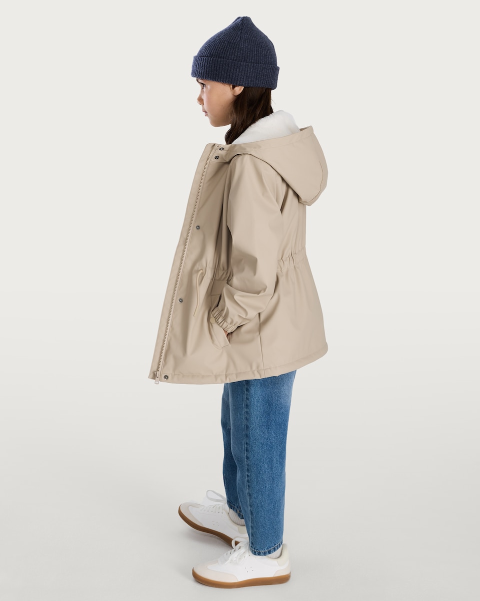 image 1 of F&F Girls Rubber Hooded Zip Through Parka in Cream