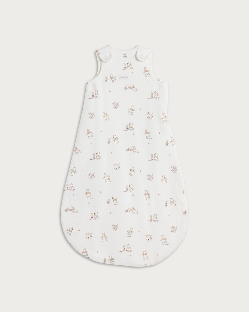 image 1 of Disney Winnie the Pooh Print Pure Cotton 1.5 Tog Sleeping Bag in White