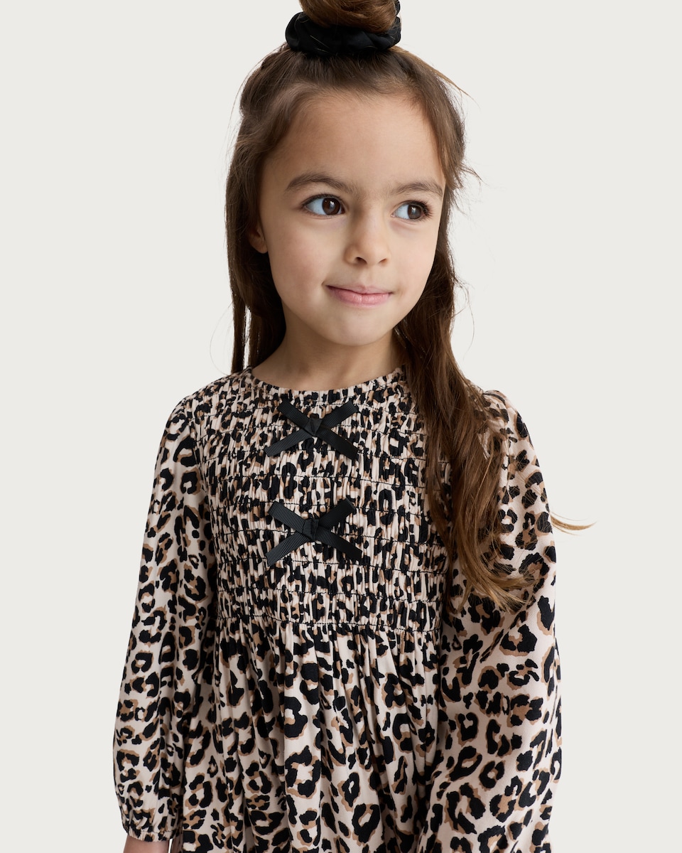 image 1 of F&F Girls Leopard Print Long Sleeved Smocked Dress in Multi
