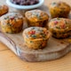 image 2 of Higgidy Slow-Roasted Tomato, Red Pepper & Basil Mini Muffins 130g