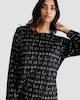 image 1 of F&F Fleece La La La Print Top and Bottoms Pyjamas in Black