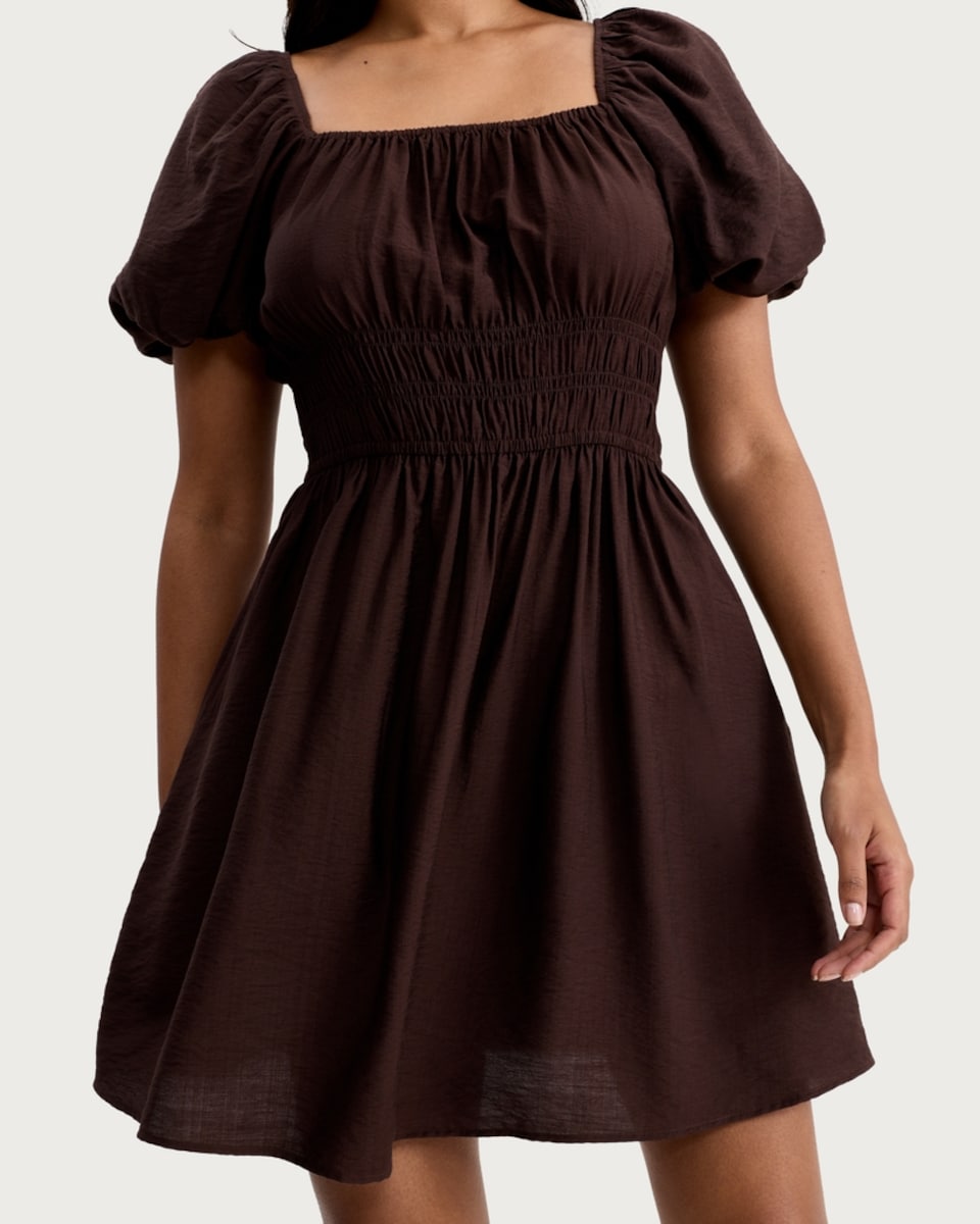 image 1 of F&F Smocked Puff Sleeved Mini Dress in Choclate