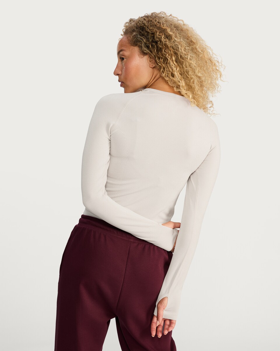 image 1 of F&F Active Seamfree Ribbed Long Sleeved Sports Top in Cream