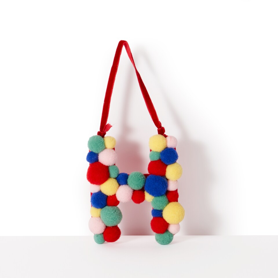 image 1 of Paperchase Cosmic Christmas Pom Pom Letter H Hanging Decoration