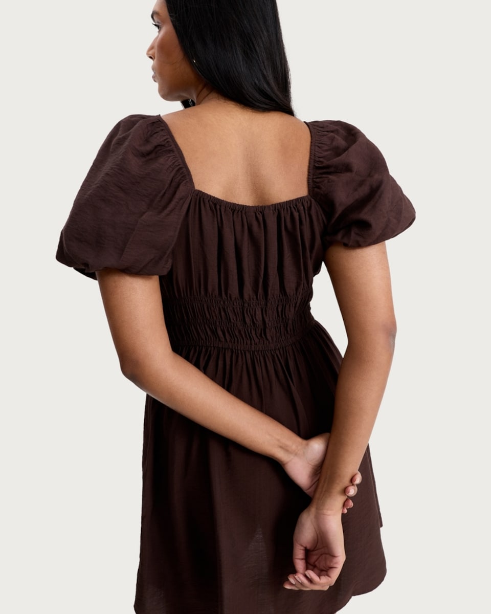 image 1 of F&F Smocked Puff Sleeved Mini Dress in Choclate