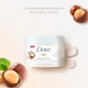 image 2 of Dove Crushed Macadamia & Rice Milk Exfoliating Body Scrub 225ml