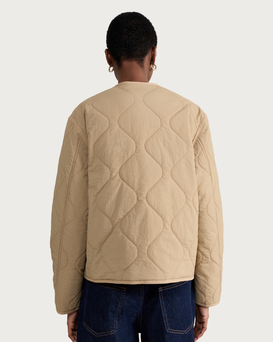 image 1 of F&F Shower Resistant Quilted Collarless Jacket in Neutral