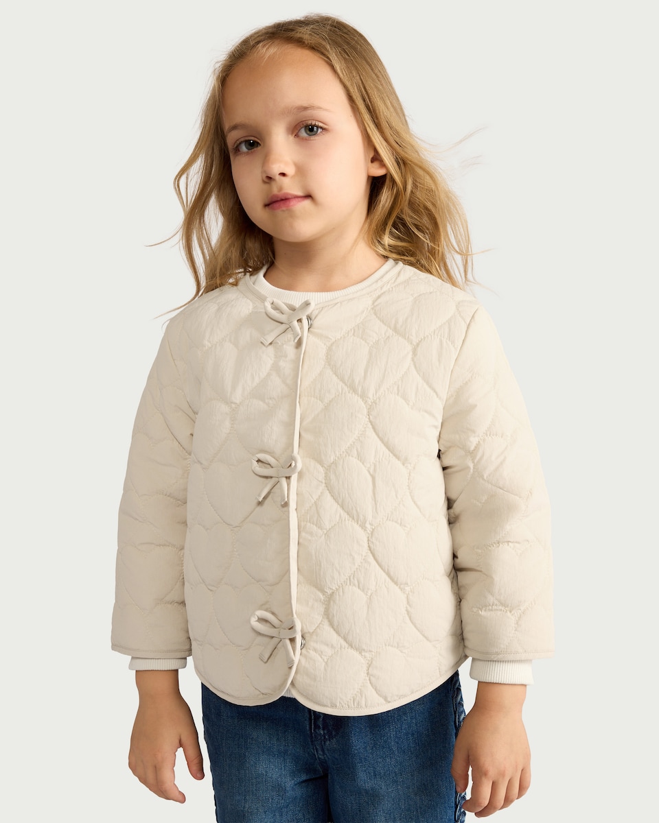 image 1 of F&F Girls Quilted Bow Front Jacket in Cream
