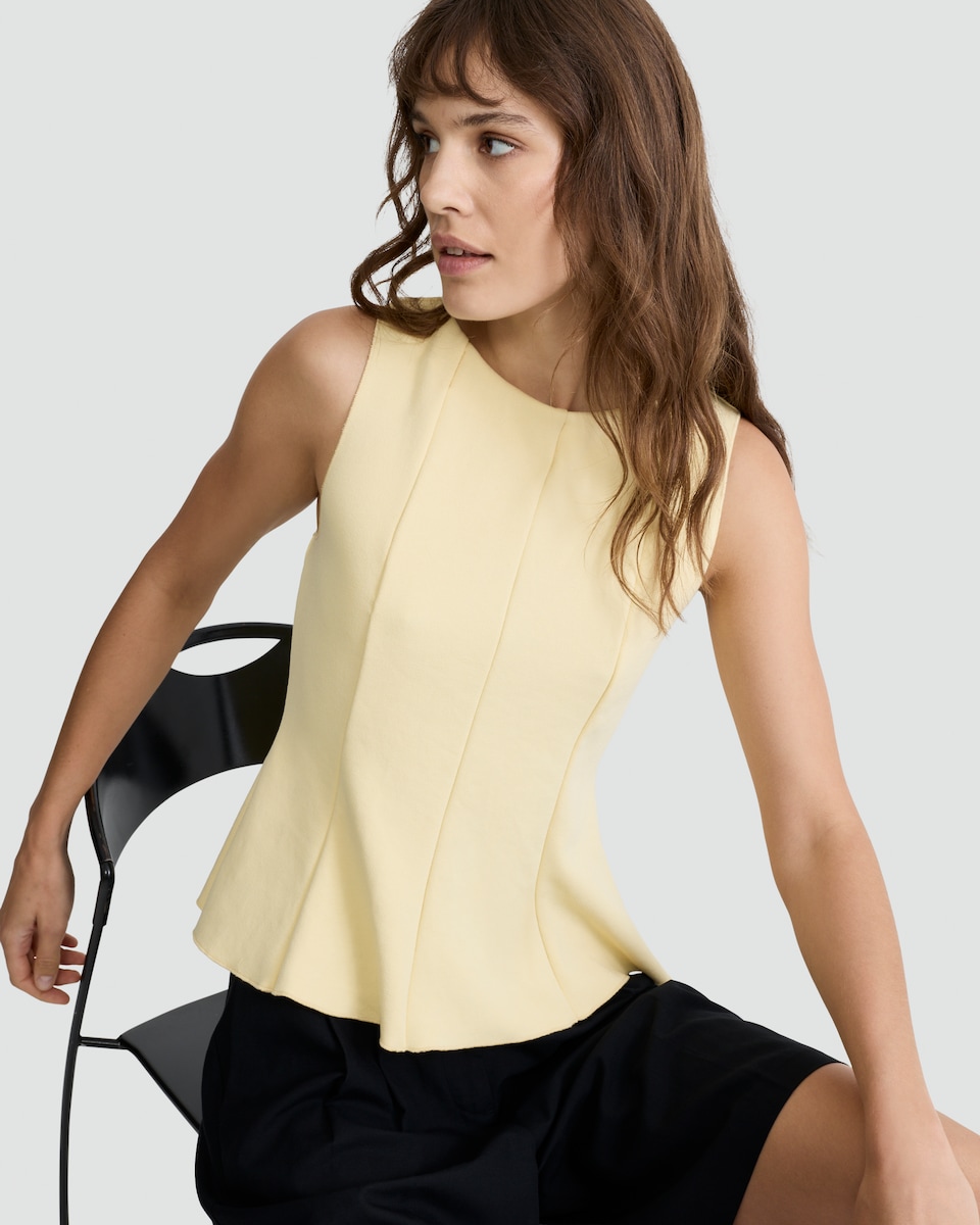 image 1 of F&F Pleated Sleeveless Peplum Top in Yellow