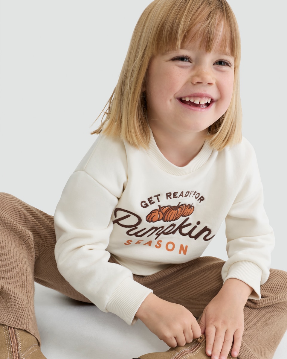 image 1 of F&F Girls Cotton Rich Pumpkin Picking Crew Sweatshirt in Cream