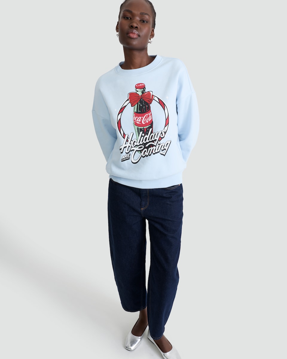 image 1 of Coca-Cola Holidays Are Coming Cotton Rich Slogan Sweatshirt in Blue