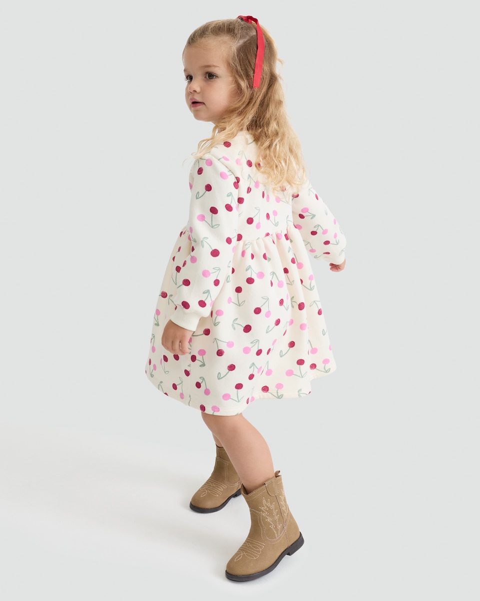 image 1 of F&F Girls Cotton Rich Cherry Print Long Sleeved Sweater Dress in Cream