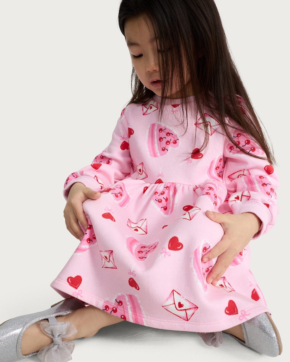 image 1 of F&F Girls Cotton Rich Heart and Cake Print Long Sleeved Sweater Dress in Pink