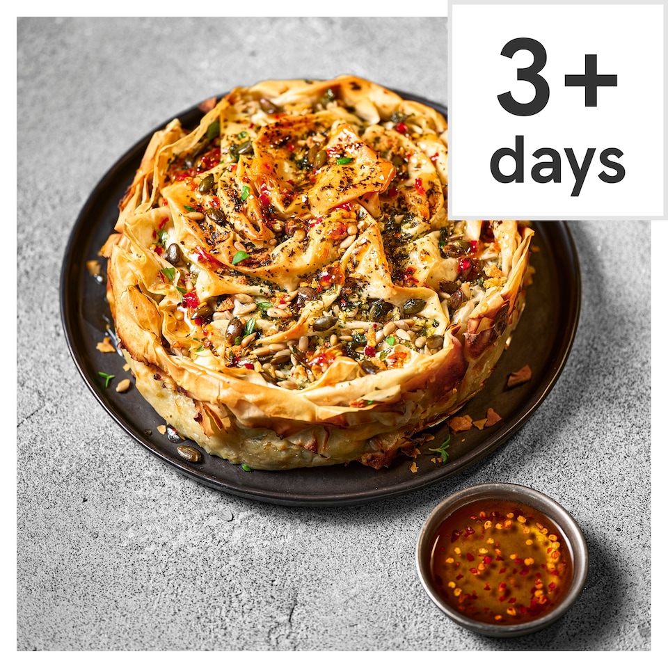 image 1 of 63. Tesco Finest Chef’s Collection Feta, Spinach & Celeriac Spanakopita with Hot Honey Drizzle 1kg (Serves 4)