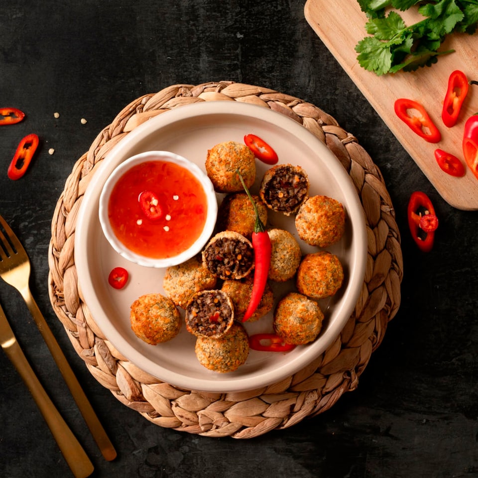 image 1 of Simon Howie Black Label 12 Sweet Chilli Haggis Bon Bons 240g