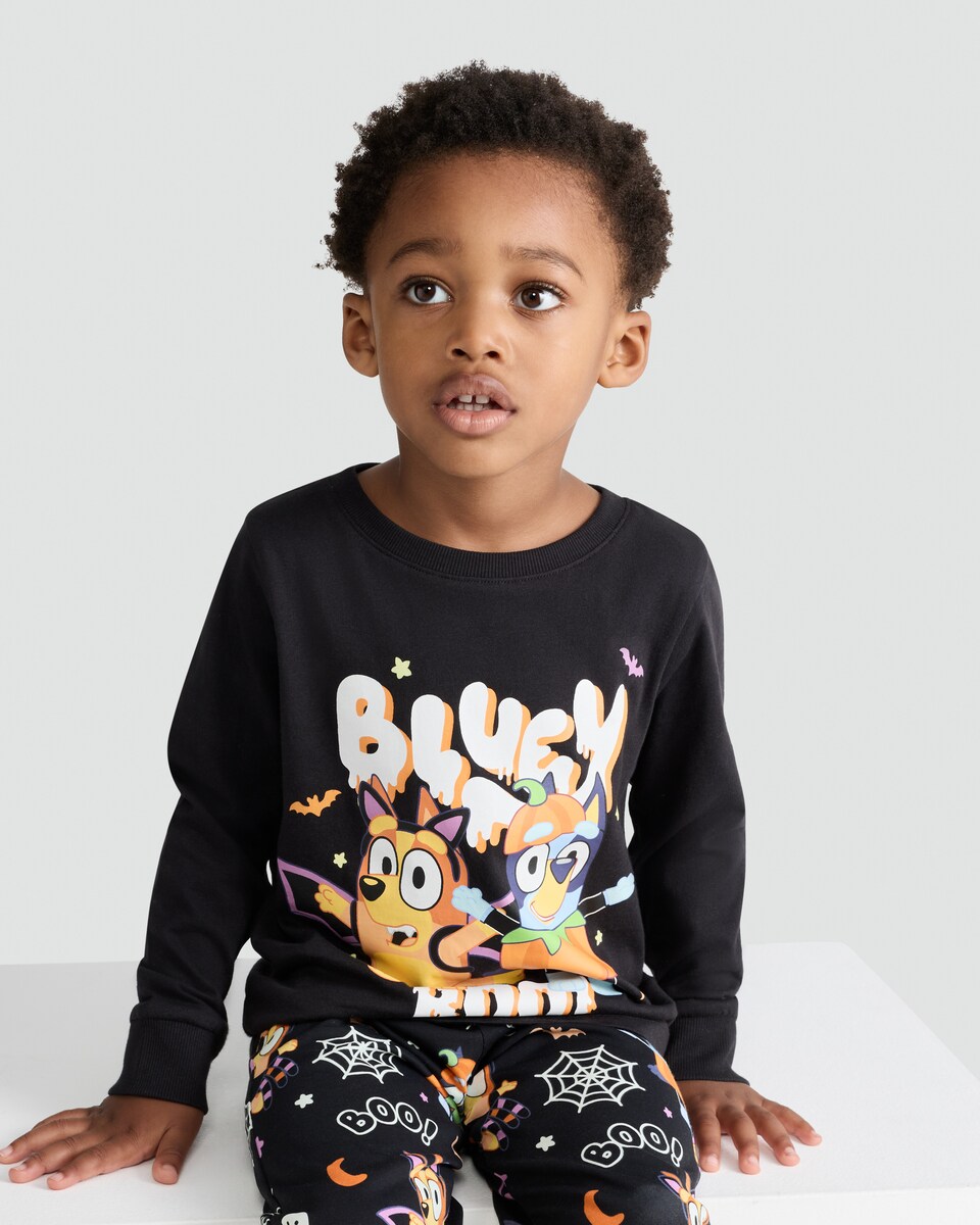 image 1 of Bluey Glow in the Dark Halloween Print Pyjama Set in Multi