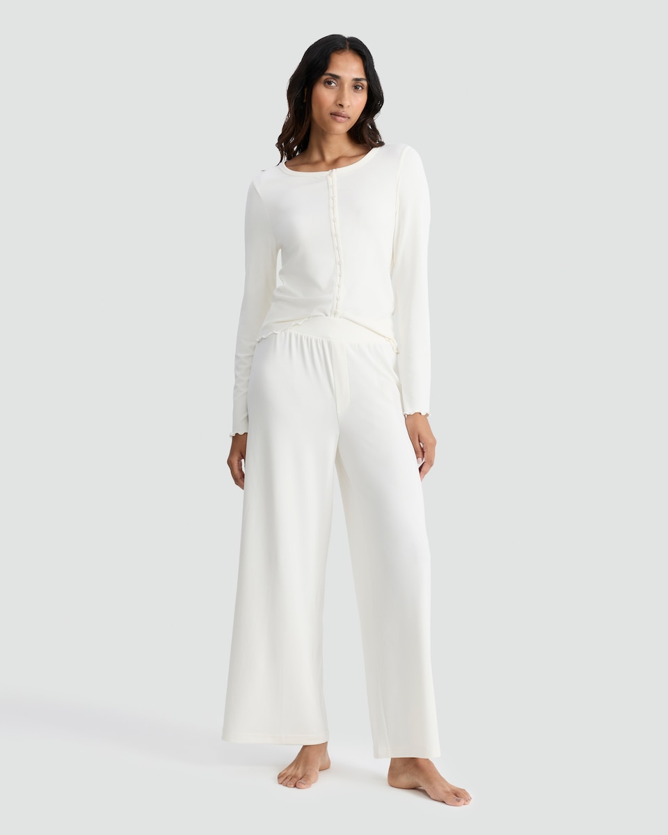 image 1 of Rise by Zara McDermott Modal Rich Wide Leg Pyjama Bottoms in Cream