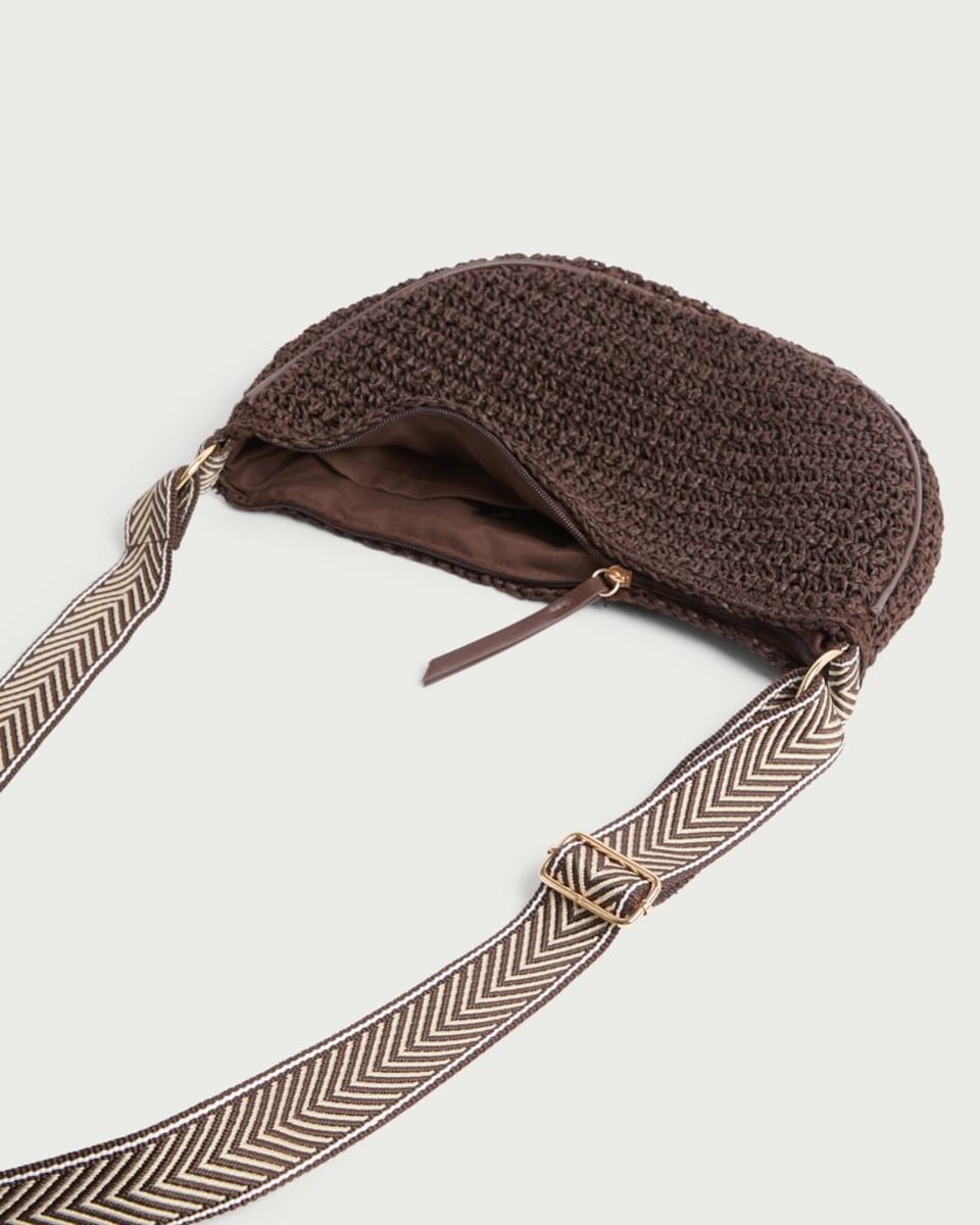 image 1 of SACHA Woven Straw Crossbody Bag in Brown