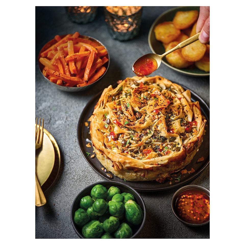 image 1 of 63. Tesco Finest Chef’s Collection Feta, Spinach & Celeriac Spanakopita with Hot Honey Drizzle 1kg (Serves 4)