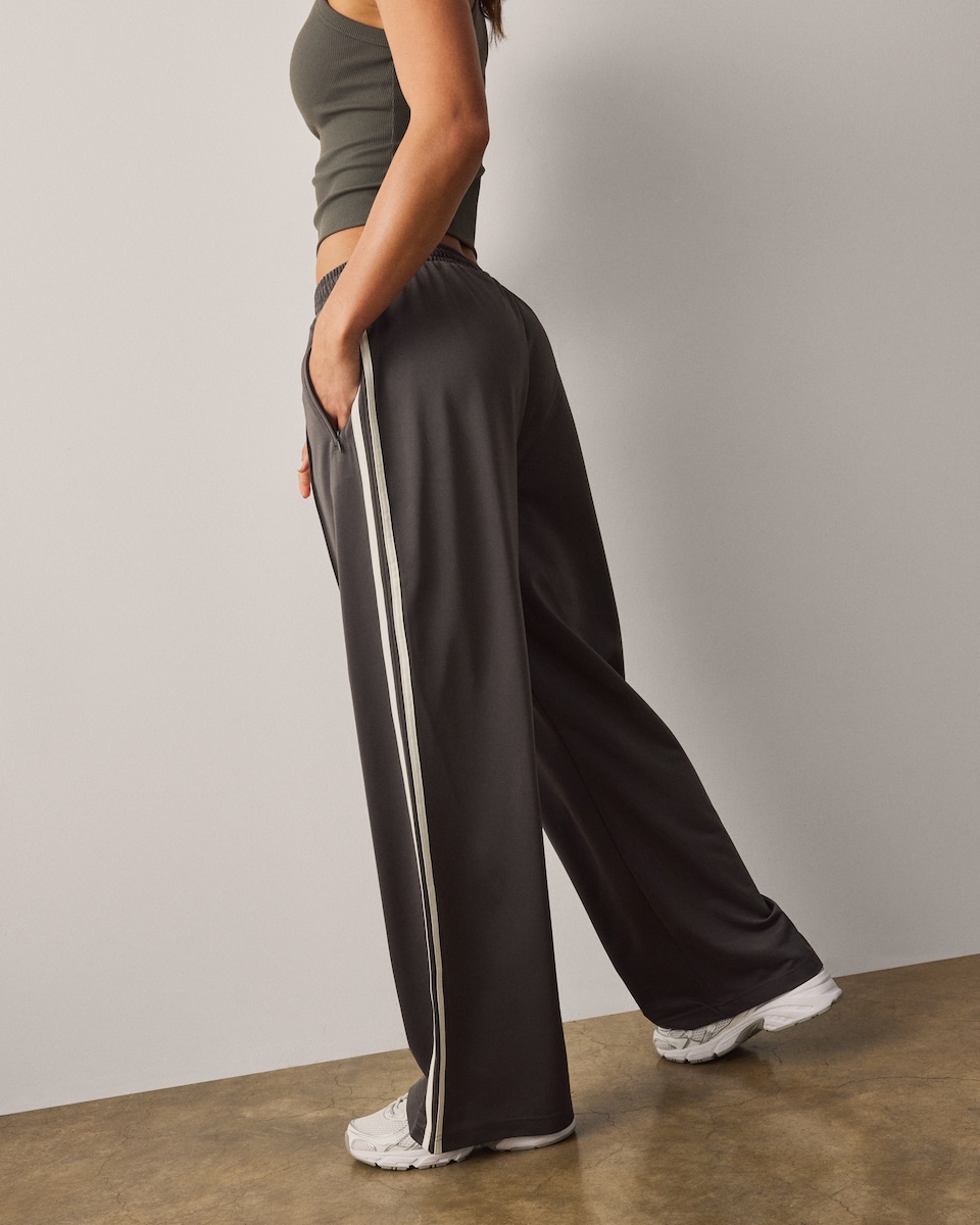 image 1 of F&F Active AFTERCLASS Side Stripe Wide Leg Joggers in Khaki