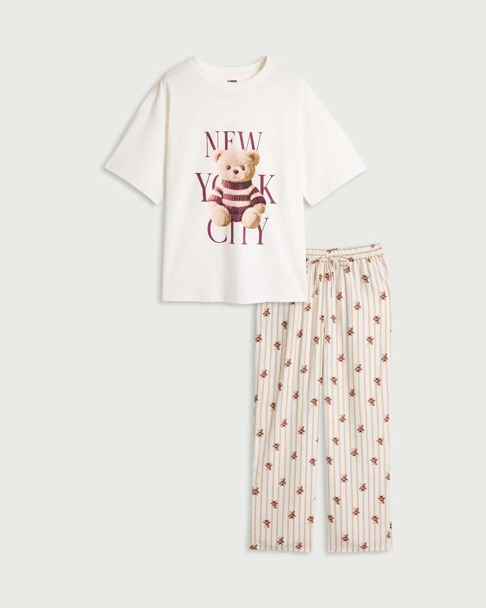 image 1 of F&F Cotton Blend NYC Bear Print Pyjama Set in Cream