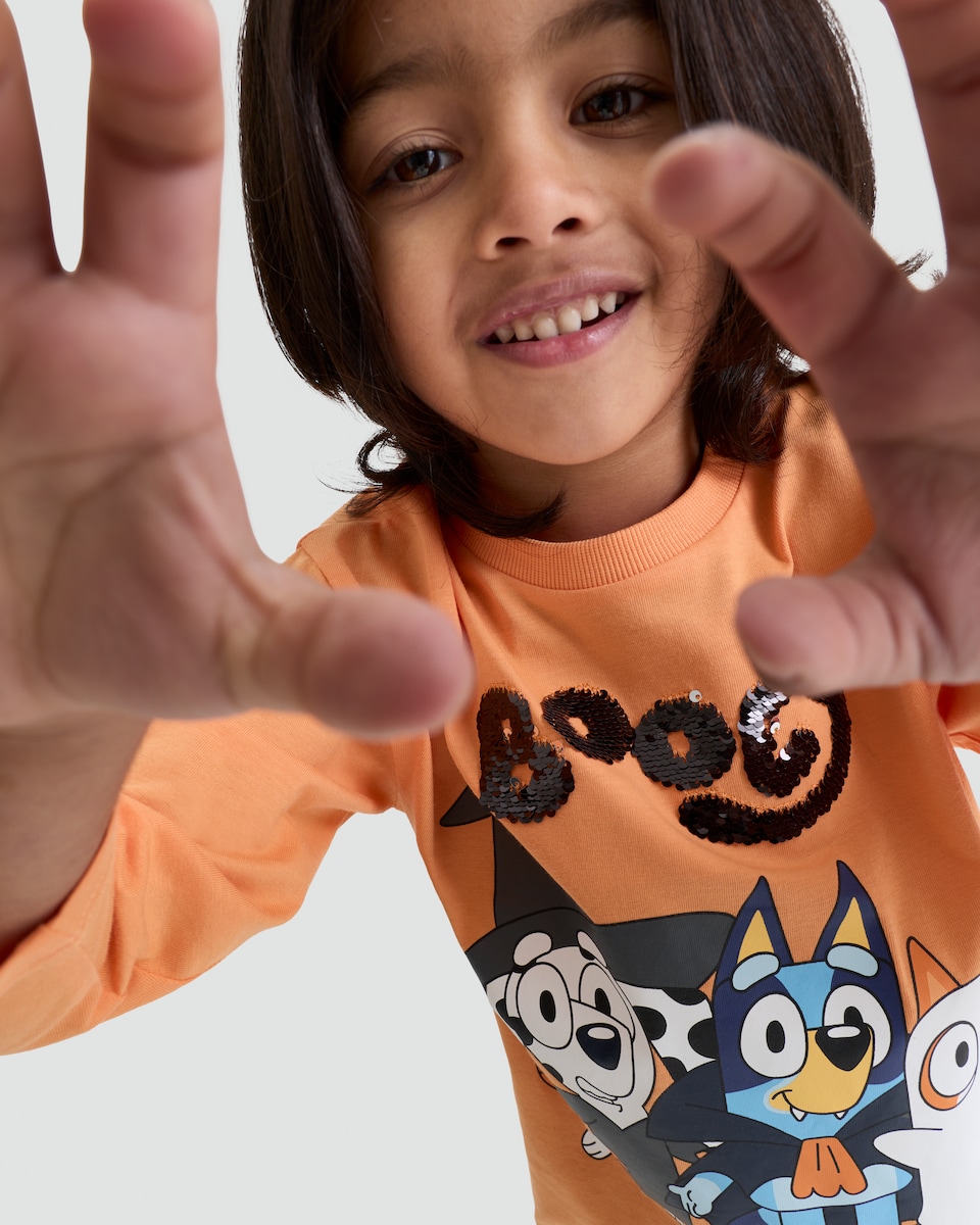 image 1 of Bluey Pure Cotton Booey Slogan Long Sleeved Top in Orange