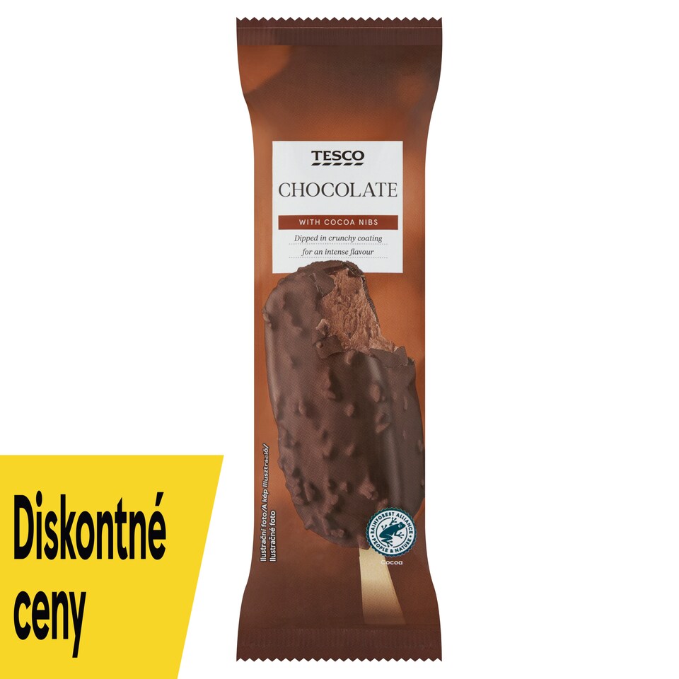 Tesco Mrazený krém s kúskami čokolády v poleve z mliečnej čokolády s kakaovými bôbmi 90 g