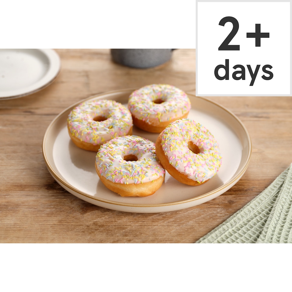 image 1 of Tesco White Iced Ring Doughnuts 4 Pack