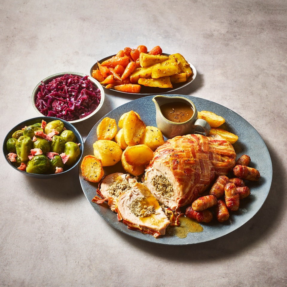 image 1 of 35. Tesco Finest Slow Cooked Turkey with all the Trimmings 3.48kg (Serves 4)