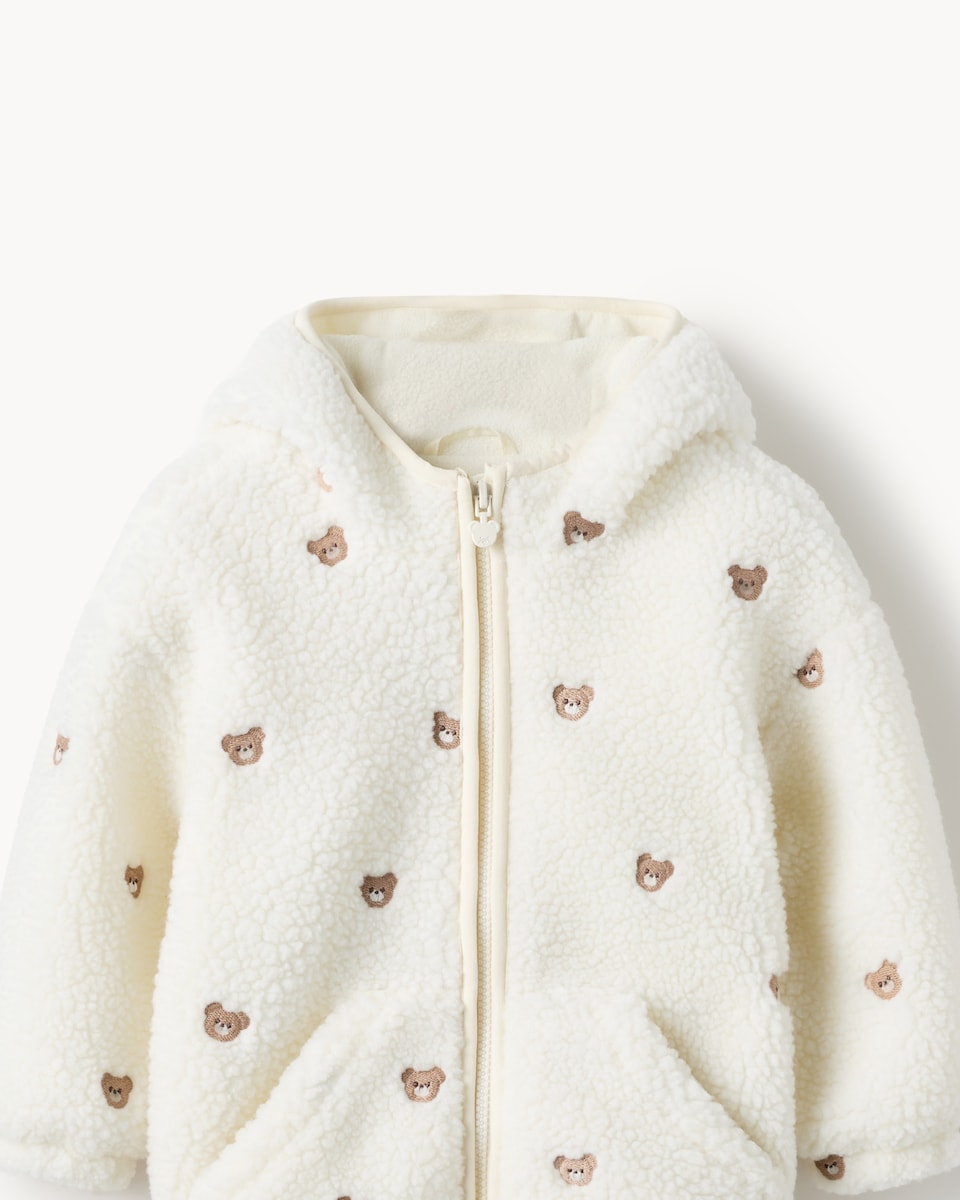 image 1 of F&F Girls Borg Bear Embroidered Hooded Jacket in Cream