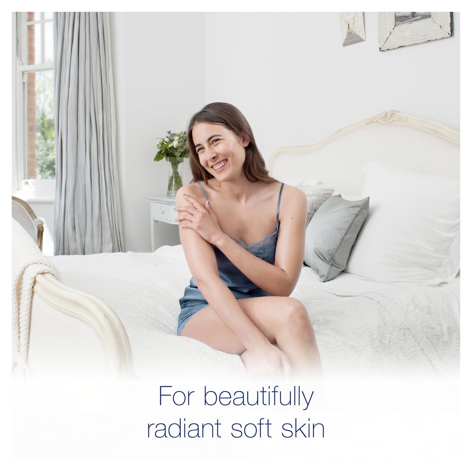 image 1 of Dove Silky Body Cream Pot 300Ml