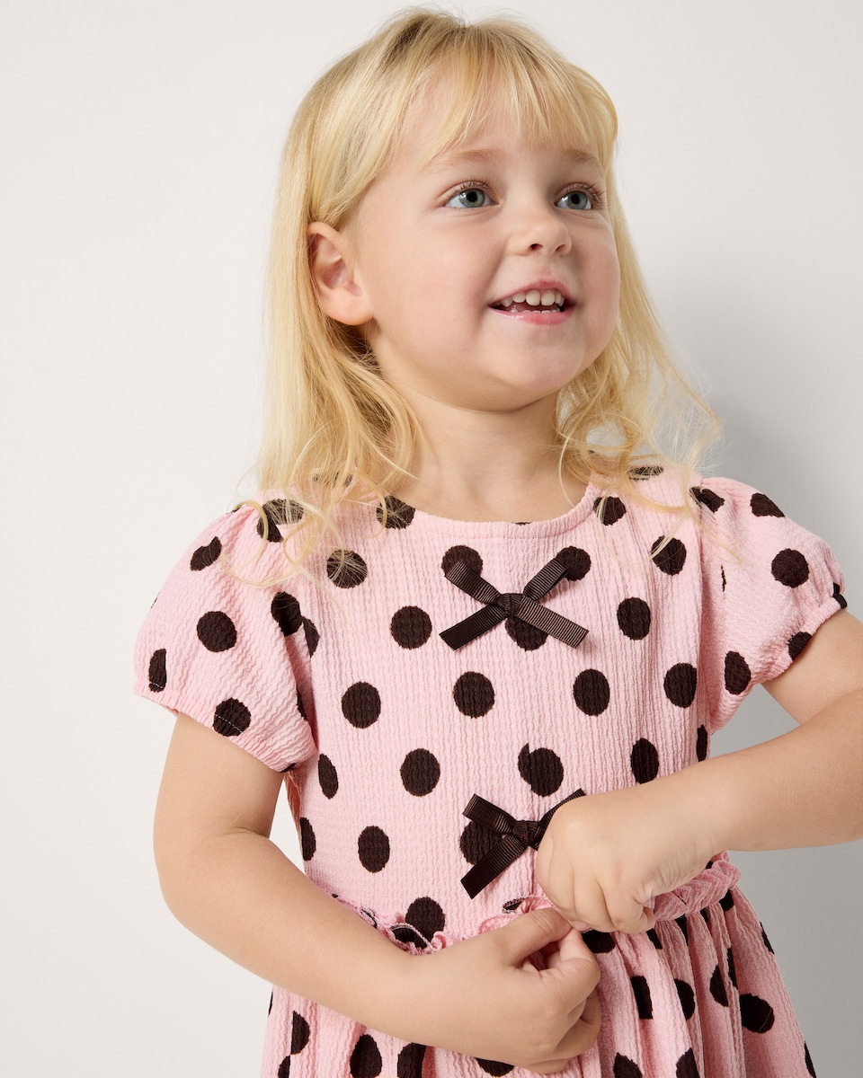 image 1 of F&F Girls Textured Polka Dot Bow Dress in Pink
