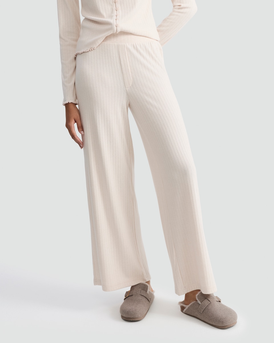 image 1 of Rise by Zara McDermott Ribbed Wide Leg Pyjama Bottoms in Stone
