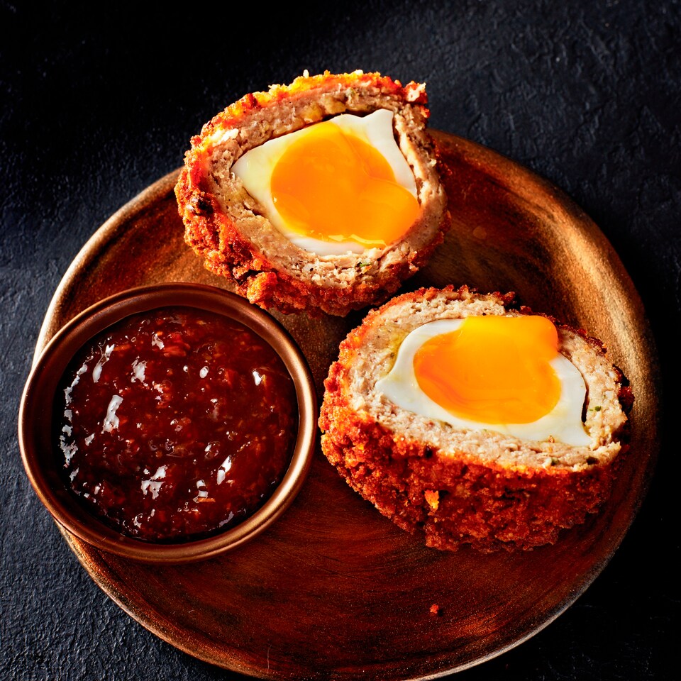 image 1 of Tesco Finest Soft Set Scotch Eggs with Tangy Pickle 290g
