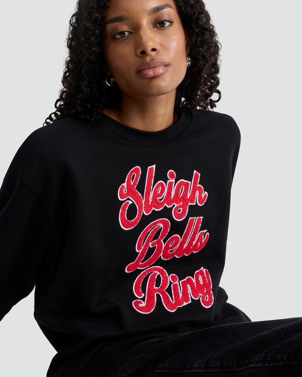 image 1 of F&F Cotton Rich Sleigh Bells Ring Textured Slogan Sweatshirt in Black