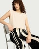 image 1 of F&F Sleeveless Shoulder Pad Top in Cream