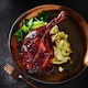 image 2 of Tesco Finest Slow Cooked Duck Legs with a Port and Berry Sauce 505g