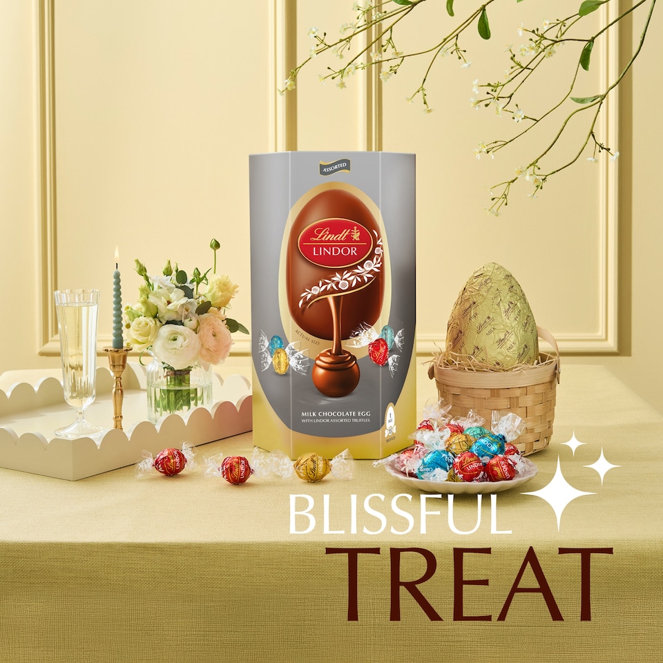 image 1 of Lindt Milk Chocolate Egg With Assorted Truffles 348G