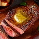 image 2 of Tesco Finest Garlic & Mixed Herb Butter With Onion 90g