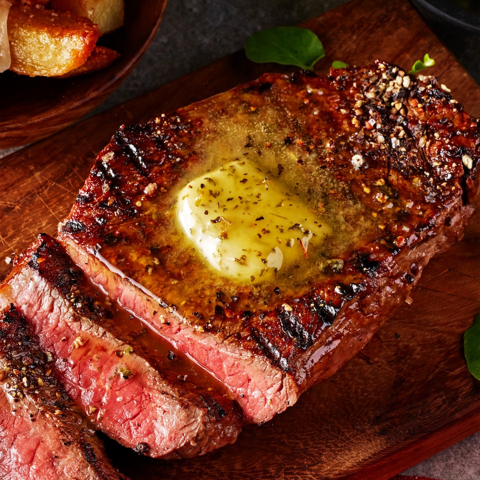 image 1 of Tesco Finest Garlic & Mixed Herb Butter With Onion 90g