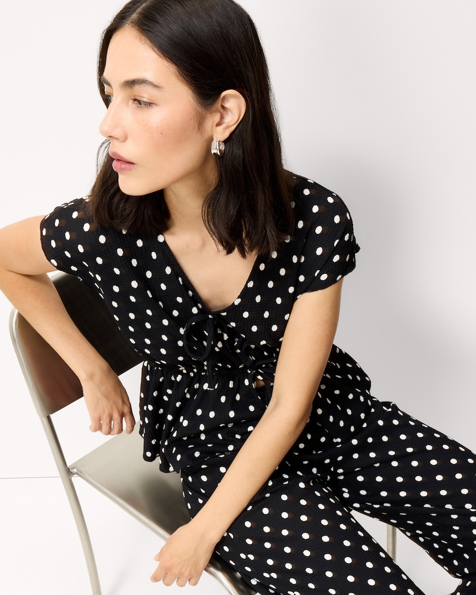 image 1 of F&F Polka Dot Tie Front Top in Multi Black