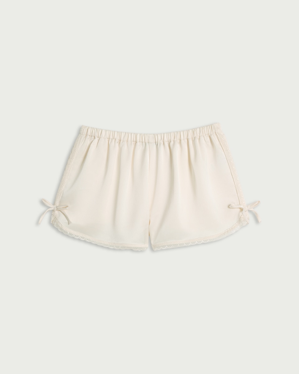 image 1 of OH ME OH MY Satin Lace Trim Shorts in Cream
