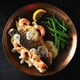 image 2 of Tesco Finest Butterflied Seabass with King Prawns & Champagne Sauce 435G