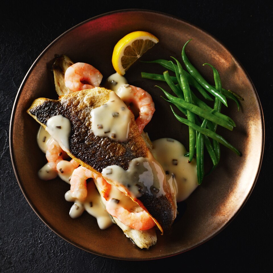 image 1 of Tesco Finest Butterflied Seabass with King Prawns & Champagne Sauce 435G