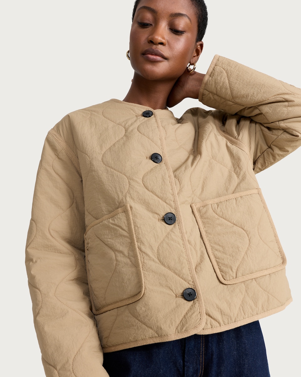 image 1 of F&F Shower Resistant Quilted Collarless Jacket in Neutral