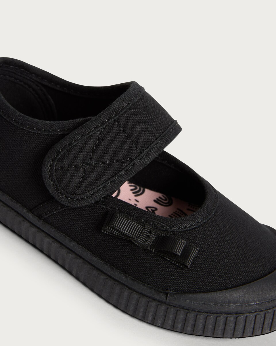 image 1 of F&F School Girls Bow Detail Mary Jane Plimsolls in Black