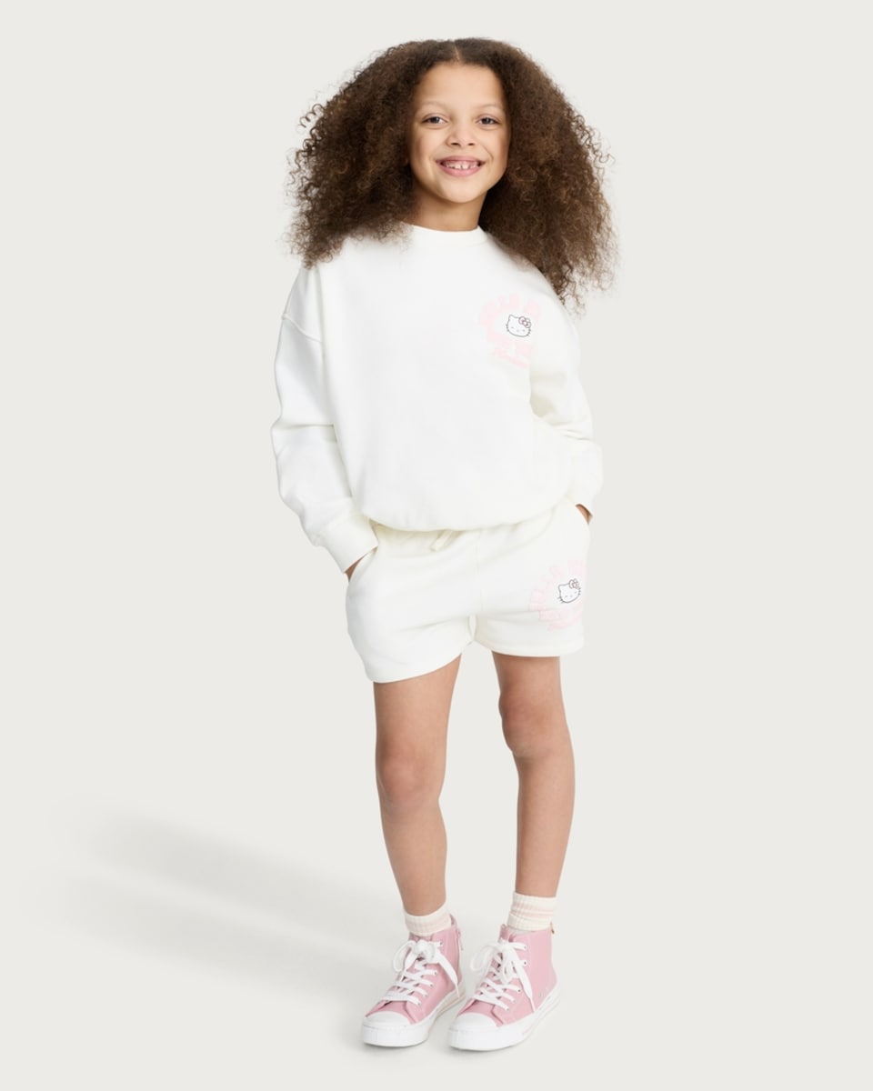 image 1 of Hello Kitty Cotton Rich Drawstring Shorts in Cream