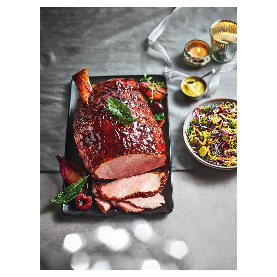 image 1 of 47. Tesco Finest Dry Cured Bone-In Gammon Joint with a Black Cherry Glaze 2.35-2.9kg (Serves 10)