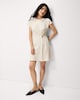 image 1 of F&F Textured Polka Dot Mini Dress in Cream